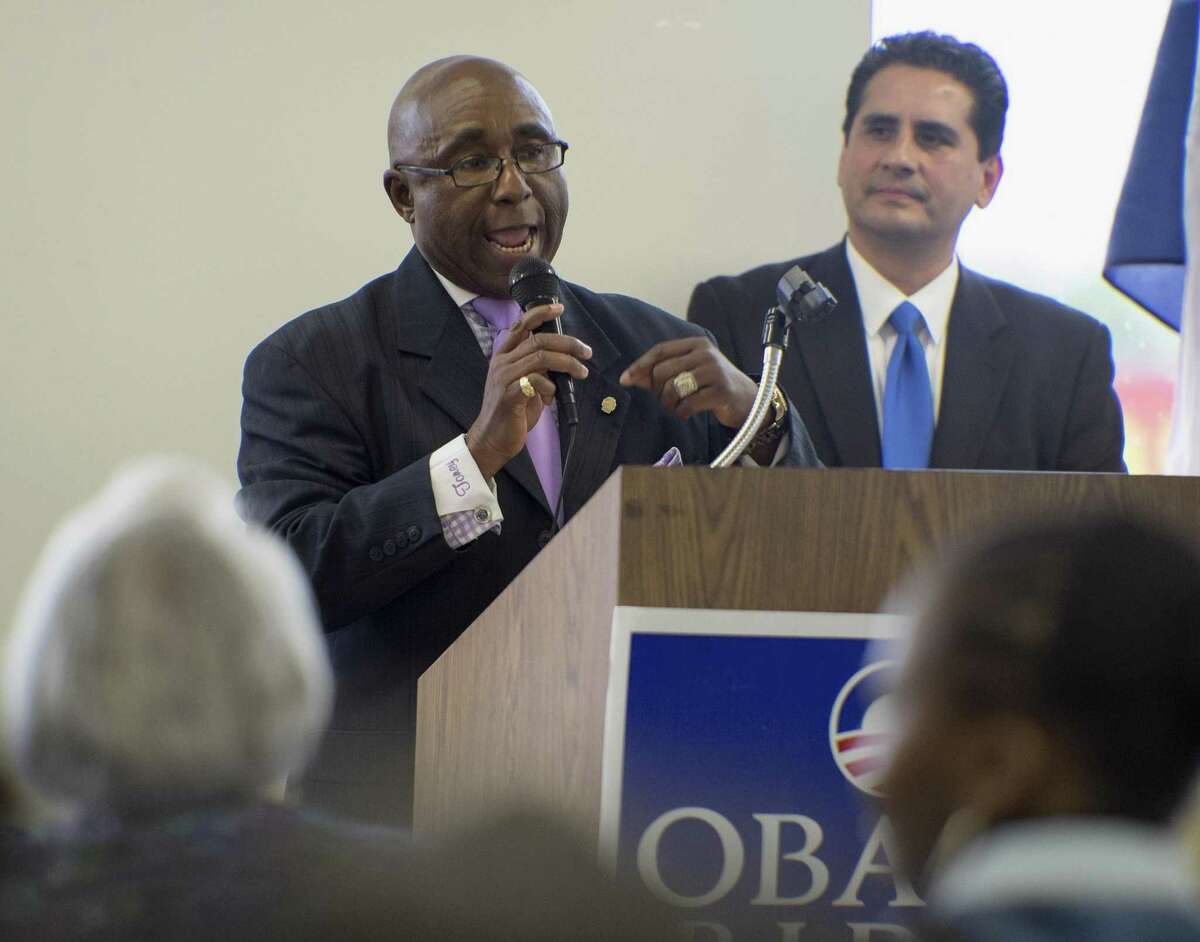 Incumbent City Council District 2 representative Keith Toney, left, speaks as Bexar Country Democratic Party chairman Manuel Medina looks on, during a candidate forum, Saturday, Sept. 27, 2014, at Second Baptist Church in San Antonio. (Darren Abate/For the Express-News)