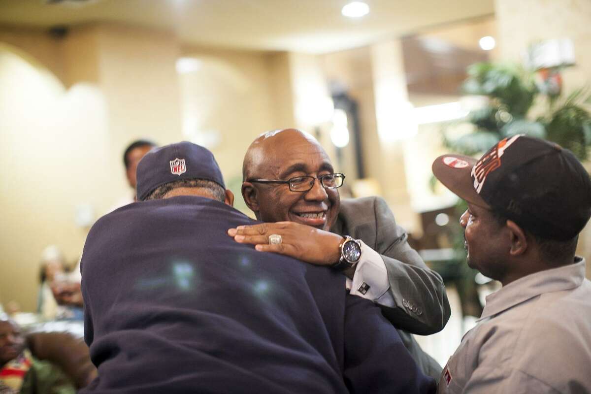 Keith Toney hugs supporters Tuesday Dec. 9, 2014 at Comfort Suites, while waiting for results of the District 2 elections.