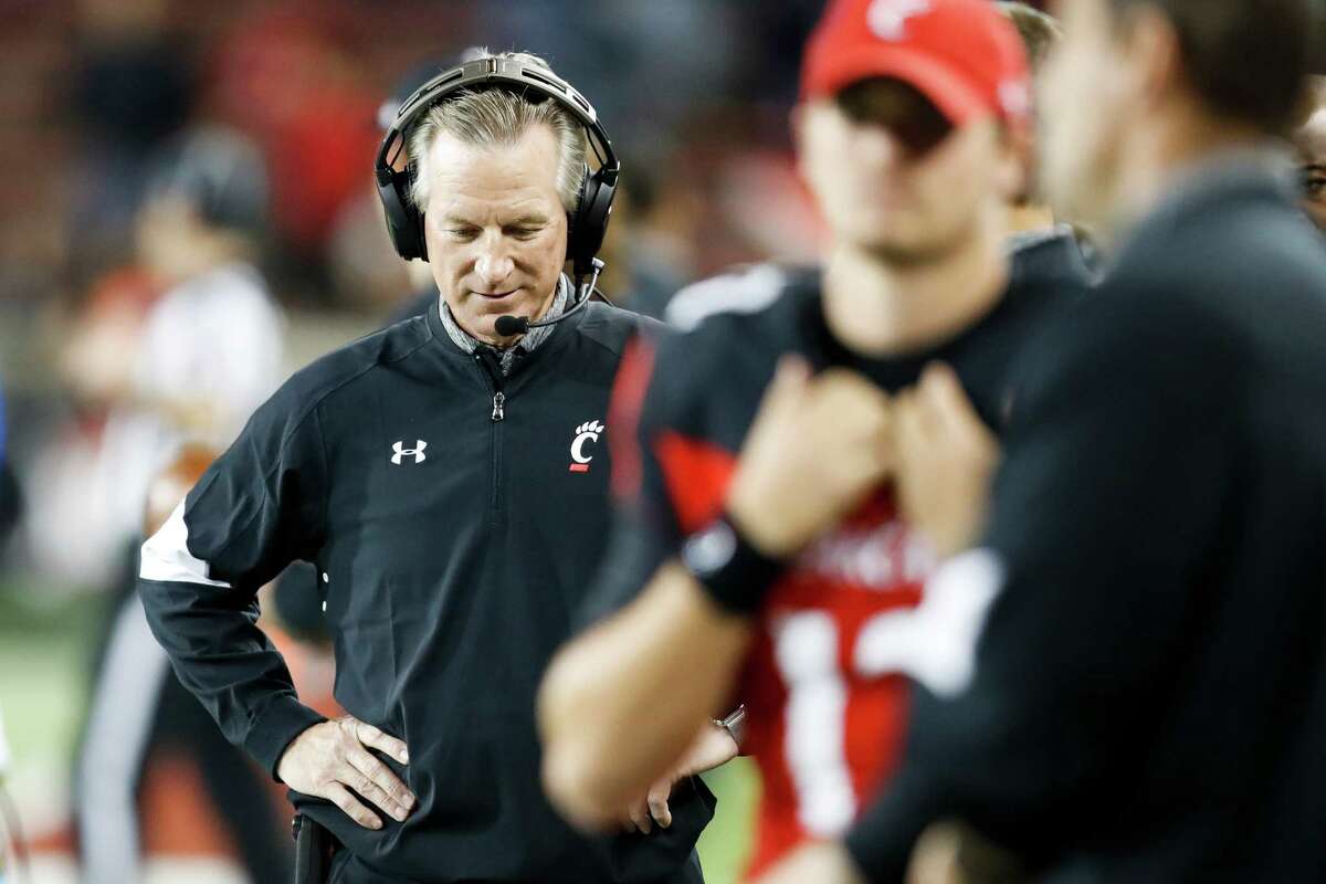 Cincinnati head coach Tommy Tuberville works the sidelines in the first half of an NCAA college football game against Memphis, Friday, Nov. 18, 2016, in Cincinnati. (AP Photo/John Minchillo)