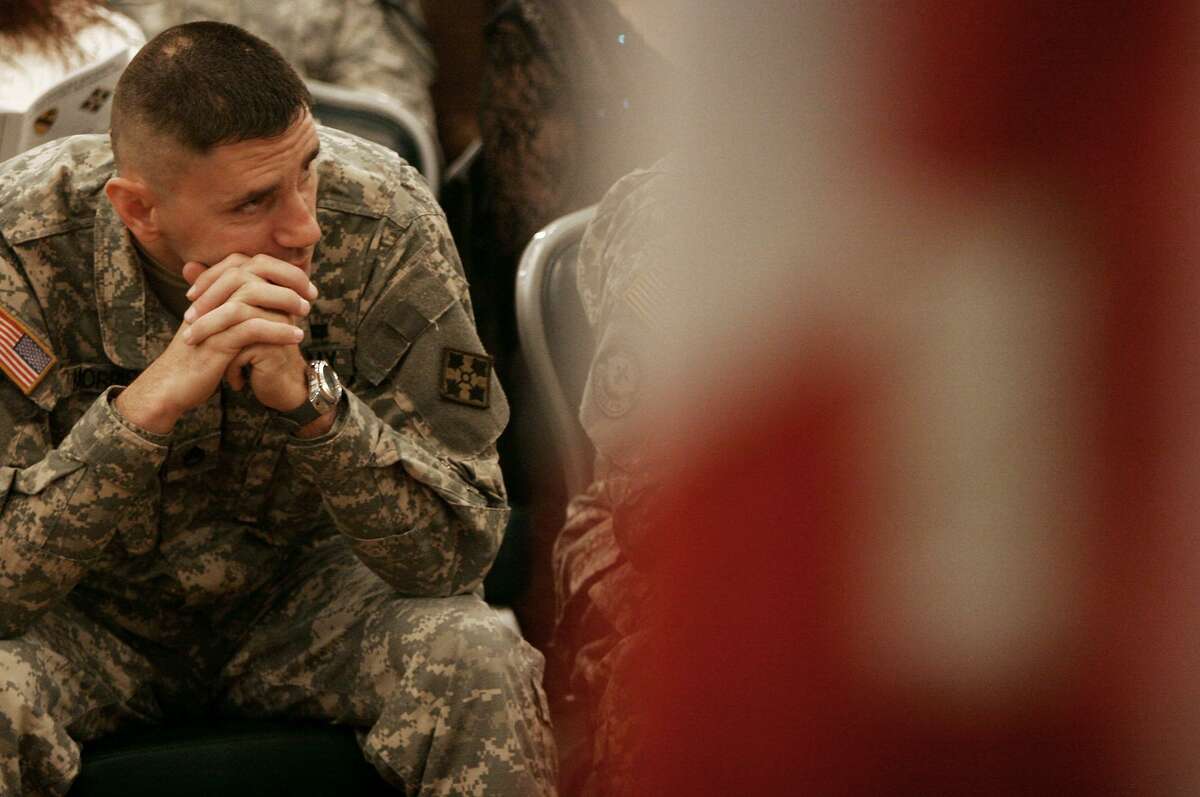 Staff Sgt. Martin L. Morris waits to be awarded the Purple Heart at Fort Hood, Tuesday, December 19, 2006. Nicole Fruge/ San Antonio Express-News