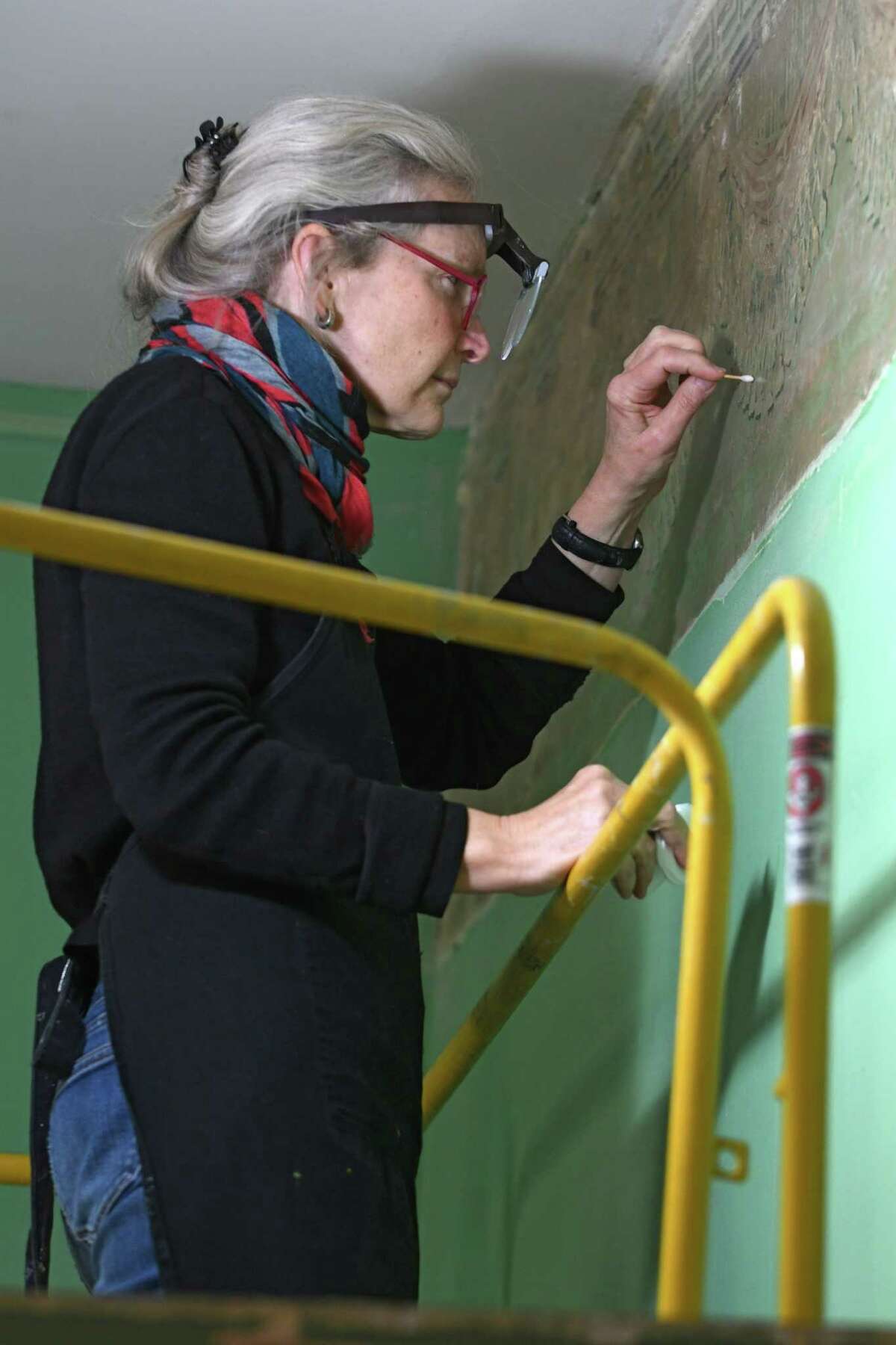 Conservator Margaret Saliske works on restoring the long lost paintings by Thomas Cole at the Thomas Cole Historic Site on Wednesday, Nov. 23, 2016 in Catskill, N.Y. Senator Charles Schumer recently secured over $600,000 to restore the lost American treasures. (Lori Van Buren / Times Union)