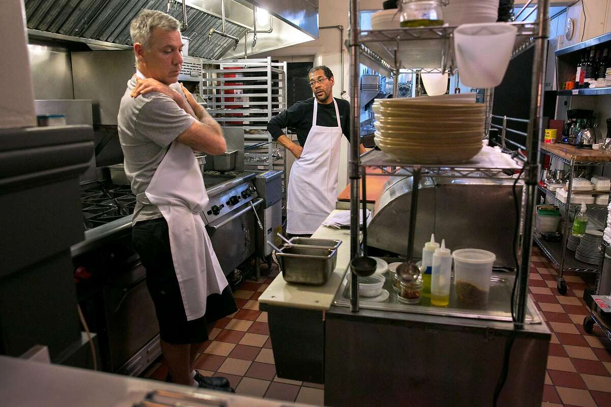 From left: Owners Barry Moore and Aaron Presbrey wait for customers during a slow business night at Roosevelt Sip 'N' Eat, on Tuesday, Nov. 22, 2016 in San Francisco, Calif.