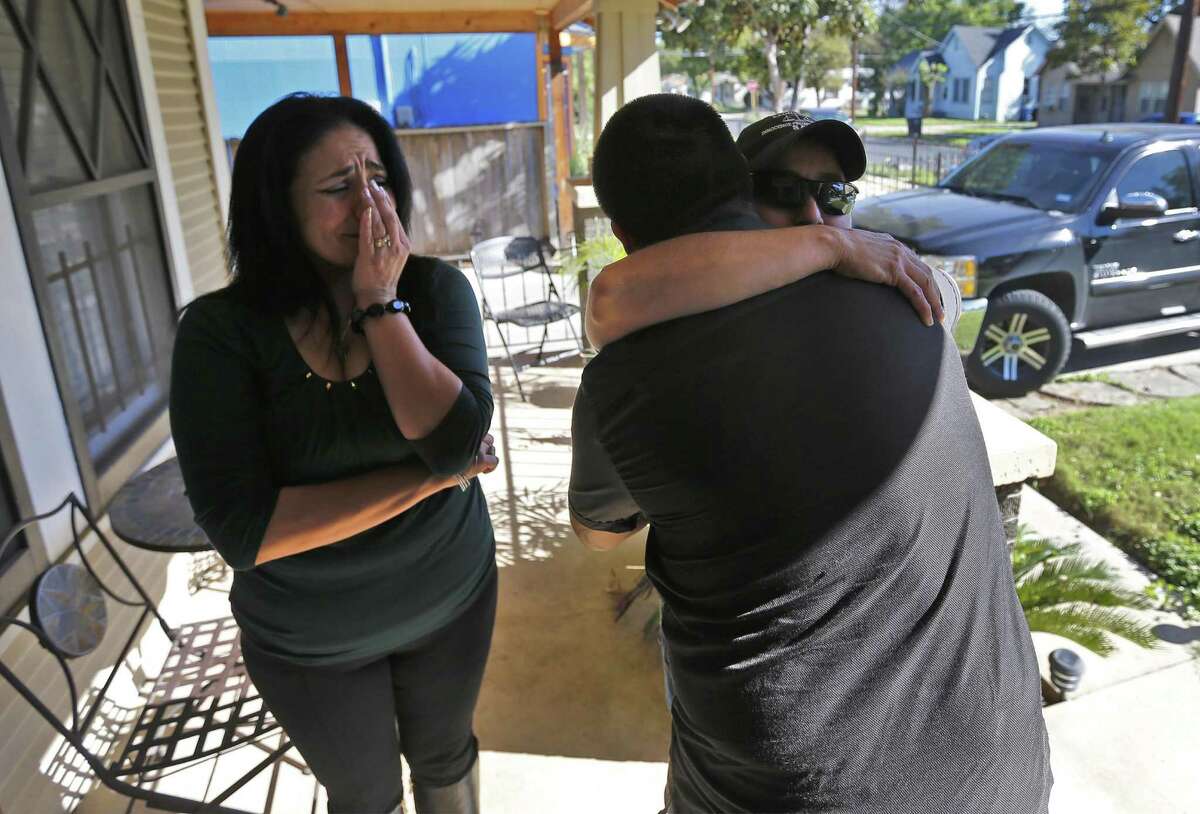 Anna Vasquez (right) receives a hug from Carlos Gonzales - the son of Cassandra Rivera (left) after they received word of their exoneration on Wednesday, Nov. 23, 2016. Vasquez, Rivera and Elizabeth Ramirez - three of the "San Antonio Four" along with family and friends gathered to react to the news of being exonerated by the Texas Court of Criminal Appeals for being convicted of sexual assault of two young girls in 1990s. Kristie Mayhugh was not present at the gathering due to work. (Kin Man Hui/San Antonio Express-News)