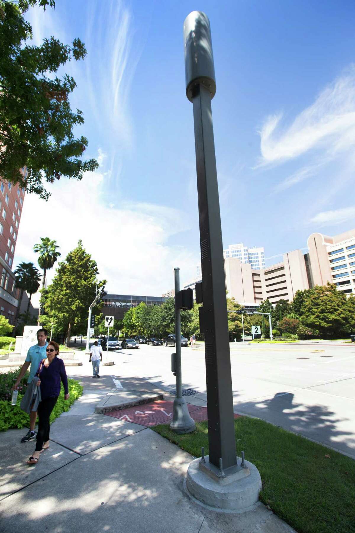 A small cell node, owned by Crown Castle, is in the Texas Medical Center. Small cells often are antennae perched on lampposts or traffic lights. ﻿