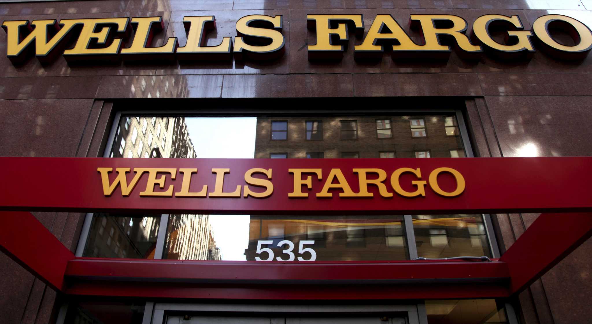 Wells Fargo splits chairman, CEO roles after sales scandal