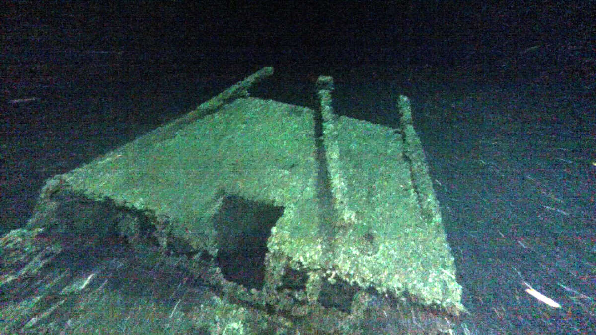 In this undated photo provided by Roger Pawlowski, the cabin and tiller of the "Black Duck" is shown in 350 feet of water off Oswego, N.Y. Underwater explorers say they've found the 144-year-old Lake Ontario shipwreck of the rare sailing vessel that typically wasn't used on the Great Lakes. Underwater explorer Jim Kennard says the Black Duck is believed to be the only fully intact scow-sloop to exist in the Great Lakes. (Roger Pawlowski via AP) ORG XMIT: NYR403