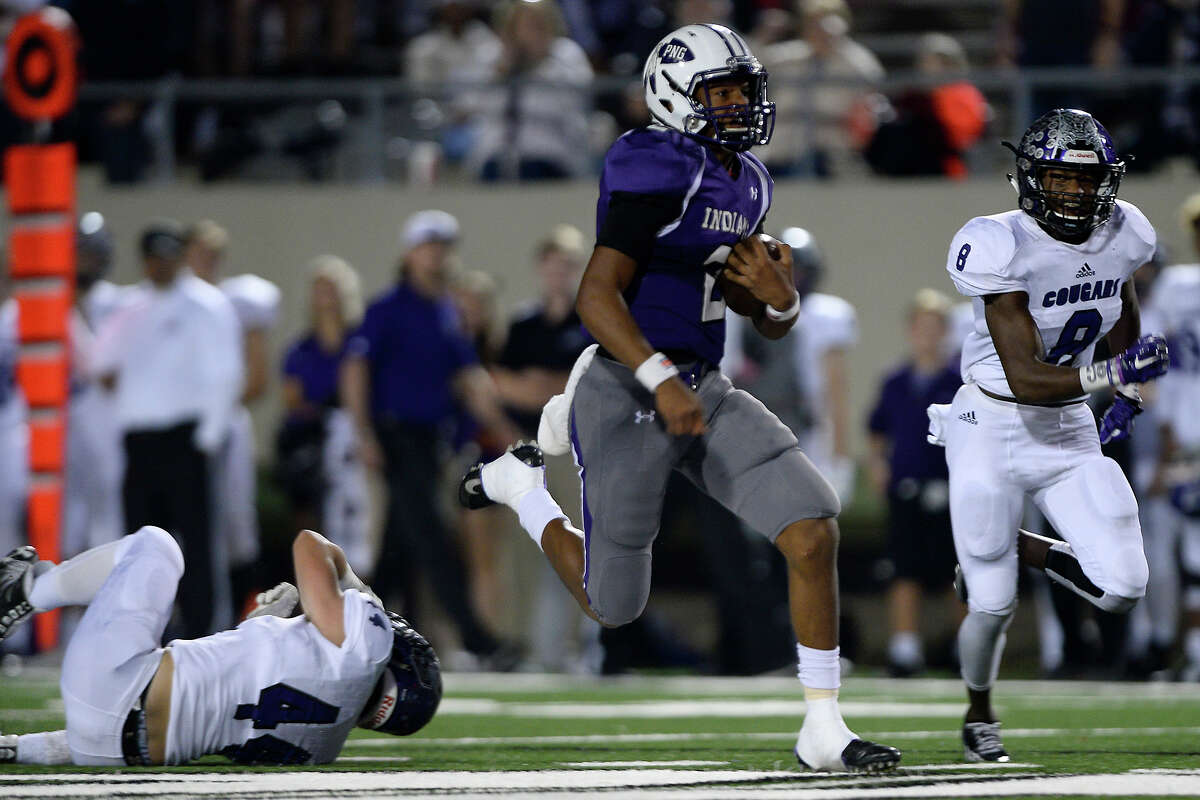 Port Neches-Groves quarterback Roschon Johnson breaks free for a touchdown during the second quarter against College Station at Stallworth Stadium in Baytown on Friday night. Photo taken Friday 11/25/16 Ryan Pelham/The Enterprise