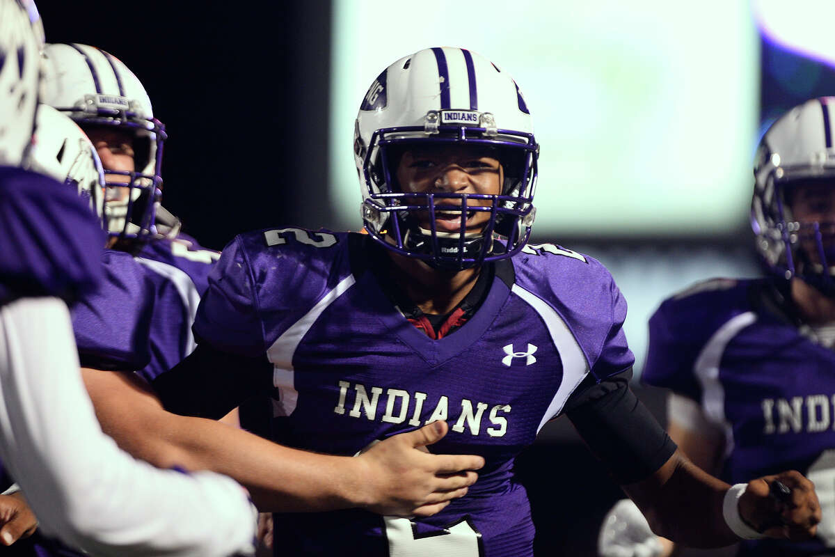 Port Neches-Groves quarterback Roschon Johnson celebrates after a touchdown run during the second quarter against College Station at Stallworth Stadium in Baytown on Friday night. Photo taken Friday 11/25/16 Ryan Pelham/The Enterprise