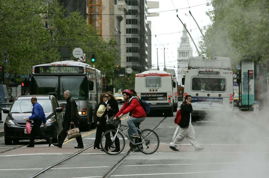 Woman hurt squeezing between Muni Metro cars - SFGate