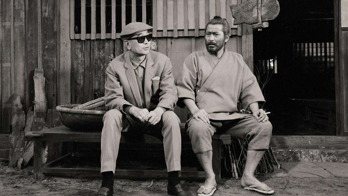 Actor Toshiro Mifune (right) and director Akira Kurosawa on the set of "Red Beard" (1965) in a scene from Steven Okazaki's documentary "Mifune" The Last Samurai."