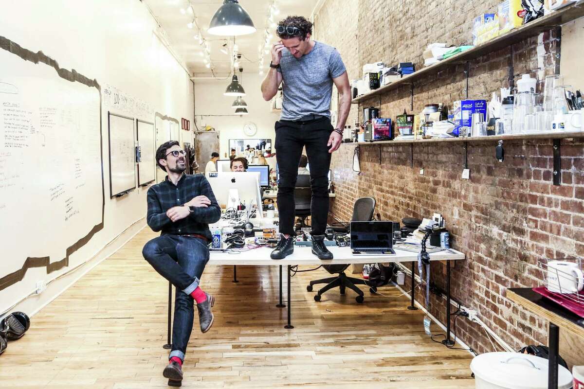 Matt Hackett (left) and Casey Neistat are shown in the Beme offices in New York. CNN announced it will acquire the technology and talent behind Beme, a social sharing app created by Hackett and Neistat, of YouTube fame, in the hopes of attracting younger viewers to the news outlet.
