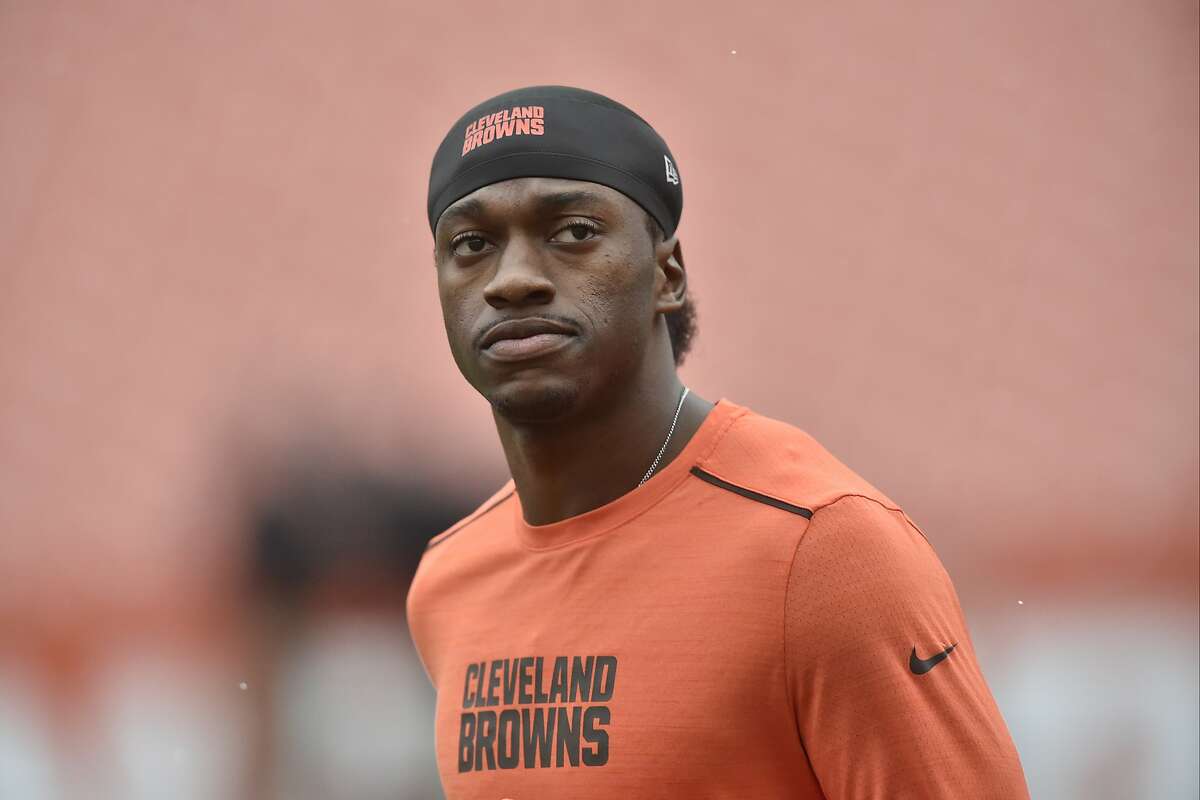 Cleveland Browns quarterback Robert Griffin III (10) watches warm ups before an NFL football game against the Pittsburgh Steelers in Cleveland, Sunday, Nov. 20, 2016. The Steelers won 24-9. (AP Photo/David Richard)
