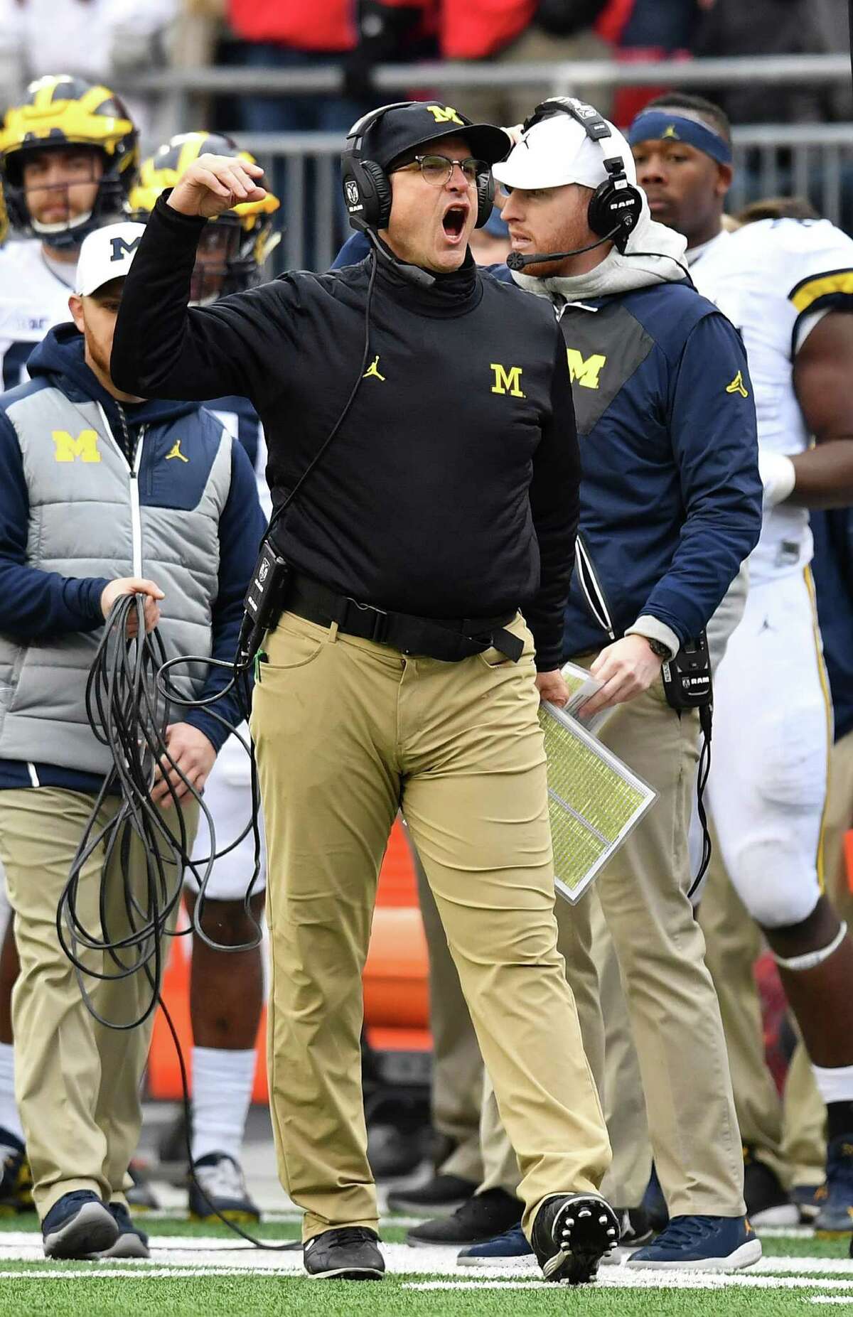 COLUMBUS, OH - NOVEMBER 26: Head coach Jim Harbaugh of the Michigan Wolverines argues a call on the sideline during the second half against the Ohio State Buckeyes at Ohio Stadium on November 26, 2016 in Columbus, Ohio.