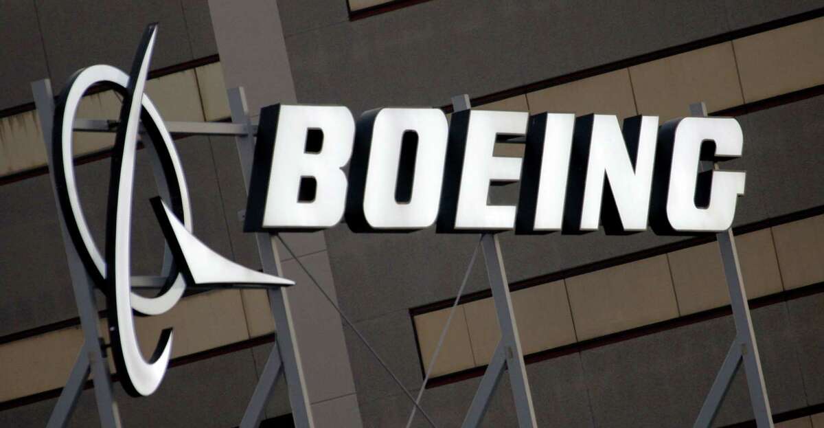 FILE - In this Jan. 25, 2011 file photo, the Boeing Company logo on the property in El Segundo, Calif. Boeing Co. A World Trade Organization panel on Monday, Nov. 28, 2016 ruled that Washington state offered billions in illegal tax breaks to plane maker Boeing, saying that the U.S. government must take action to end the plans within months. (AP Photo/Reed Saxon, File)