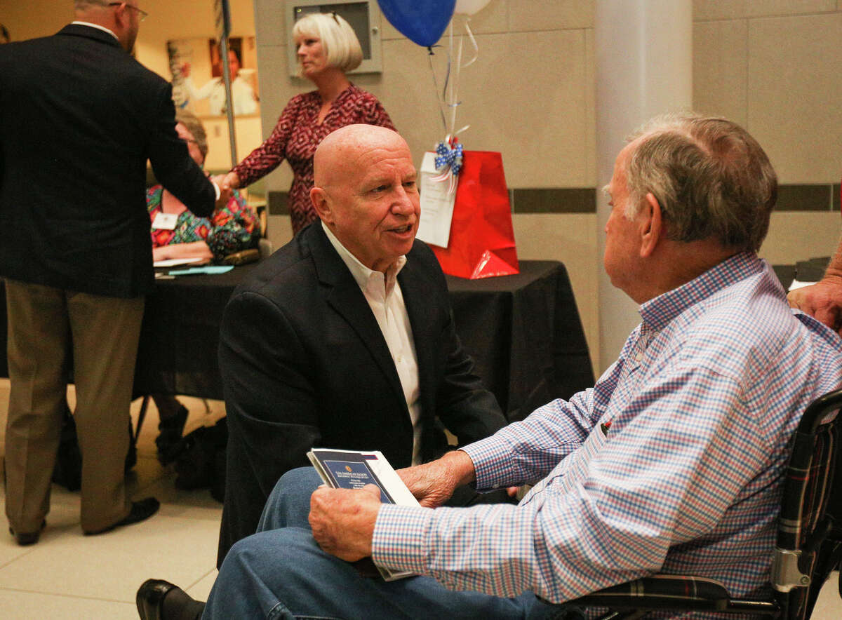 U.S. Rep. Kevin Brady, R-The Woodlands, chats with Marine Corps veteran Bob Clark during the Veterans Resource Fair on Monday, Nov. 28, 2016, at Lone Star College-Montgomery.
