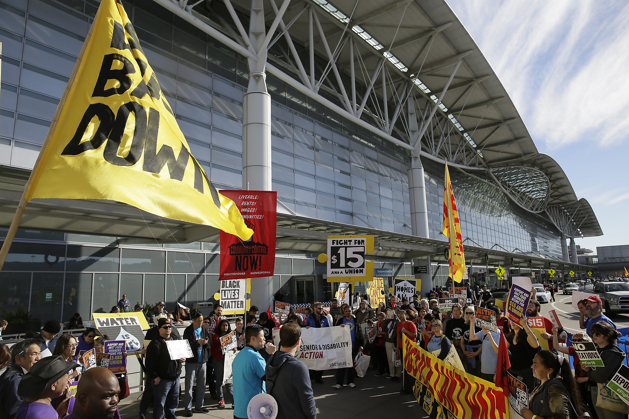 Workers Hold SFO, Oakland Strikes For National $15 Wage