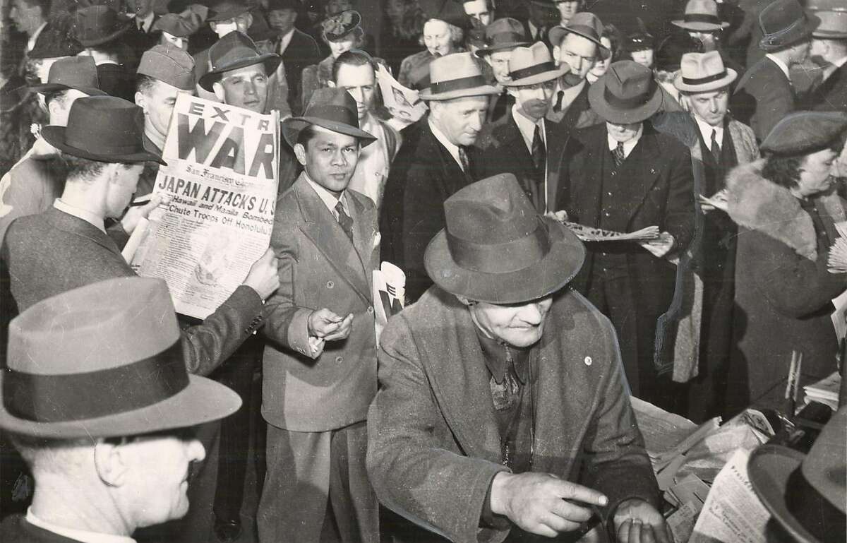 FP27-C-24MAY01-LV-HO WWII PEARL HARBOR DAY 1941 S.F. Selling newspapers on Market Street @ Eddy. CHRONICLE FILE PHOTO