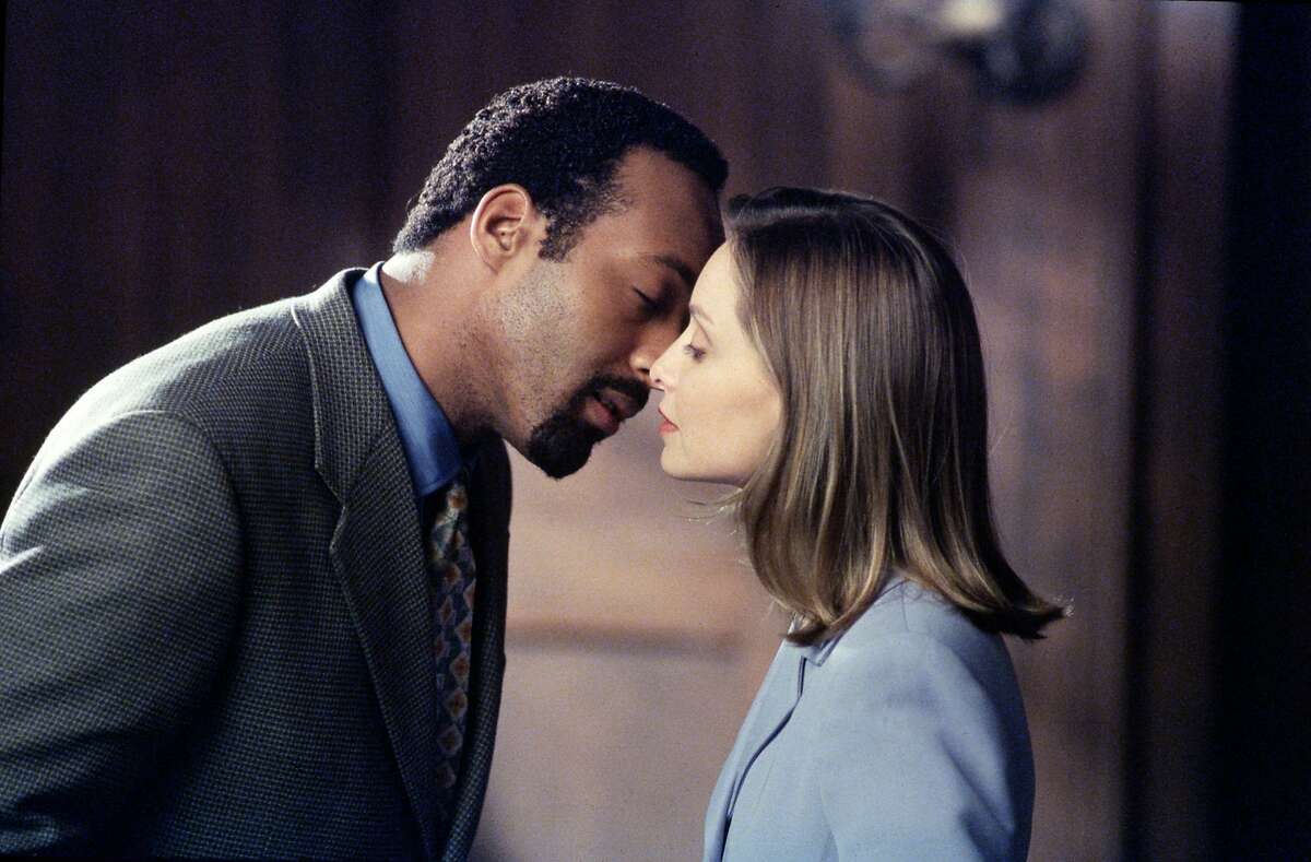 29848 ALLY McBEAL: Ally (Calista Flockhart, R) gets close to a doctor (Jesse Martin, L) -- romantically, not medically on the ALLY McBEAL episode 'Theme Of Life,' Monday, March 9 (9:00-10:00 PM ET/PT) on FOX. 1998 FOX BROADCASTING COMPANY CR: LARRY WATSON HOUCHRON CAPTION (02/11/1999): Ally (Calista Flockhart) gets close to a doctor (Jesse L. Martin) romantically, not medically, on Ally McBeal. HOUCHRON CAPTION (12/28/1999): Jesse L. Martin made the jump from a recurring role on Fox's Ally McBeal as Dr. Greg Butters, Ally's (Calista Flockhart) love interest, to the role of Edward Green on "Law & Order''.