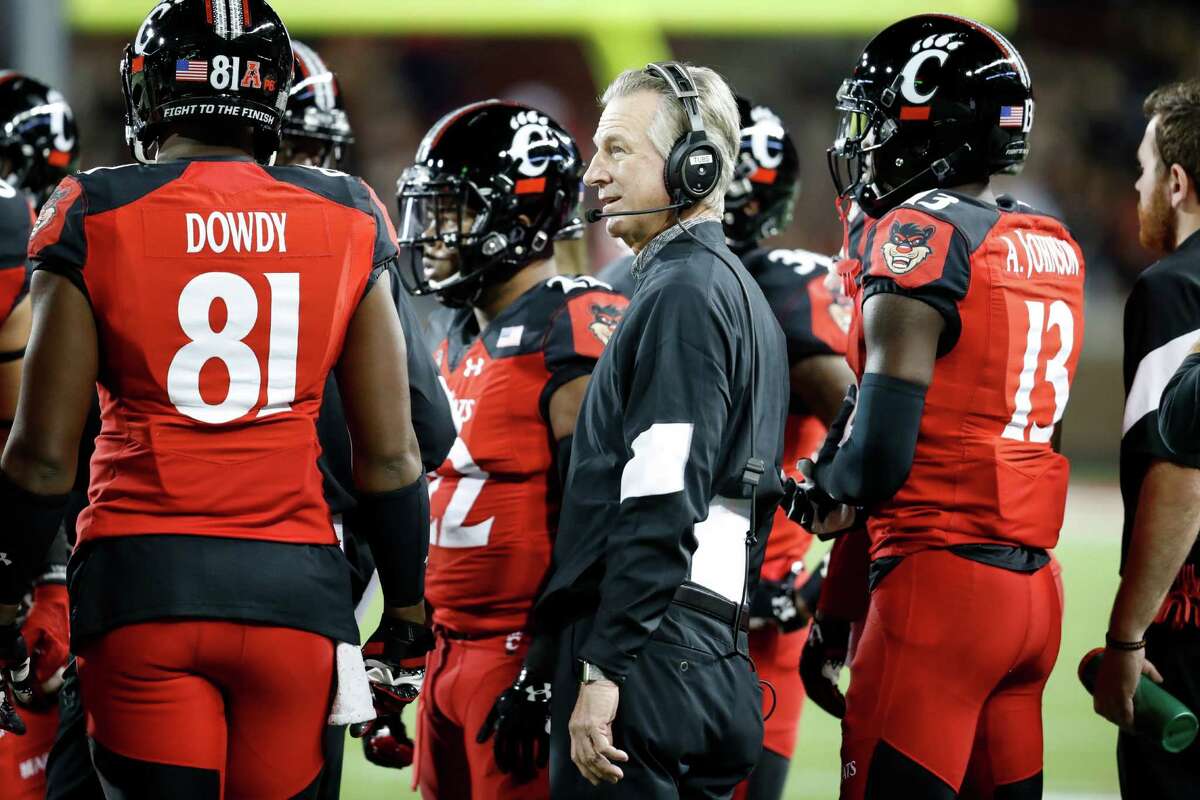Cincinnati head coach Tommy Tuberville works the sidelines in the first half of an NCAA college football game against Memphis, Friday, Nov. 18, 2016, in Cincinnati. (AP Photo/John Minchillo)