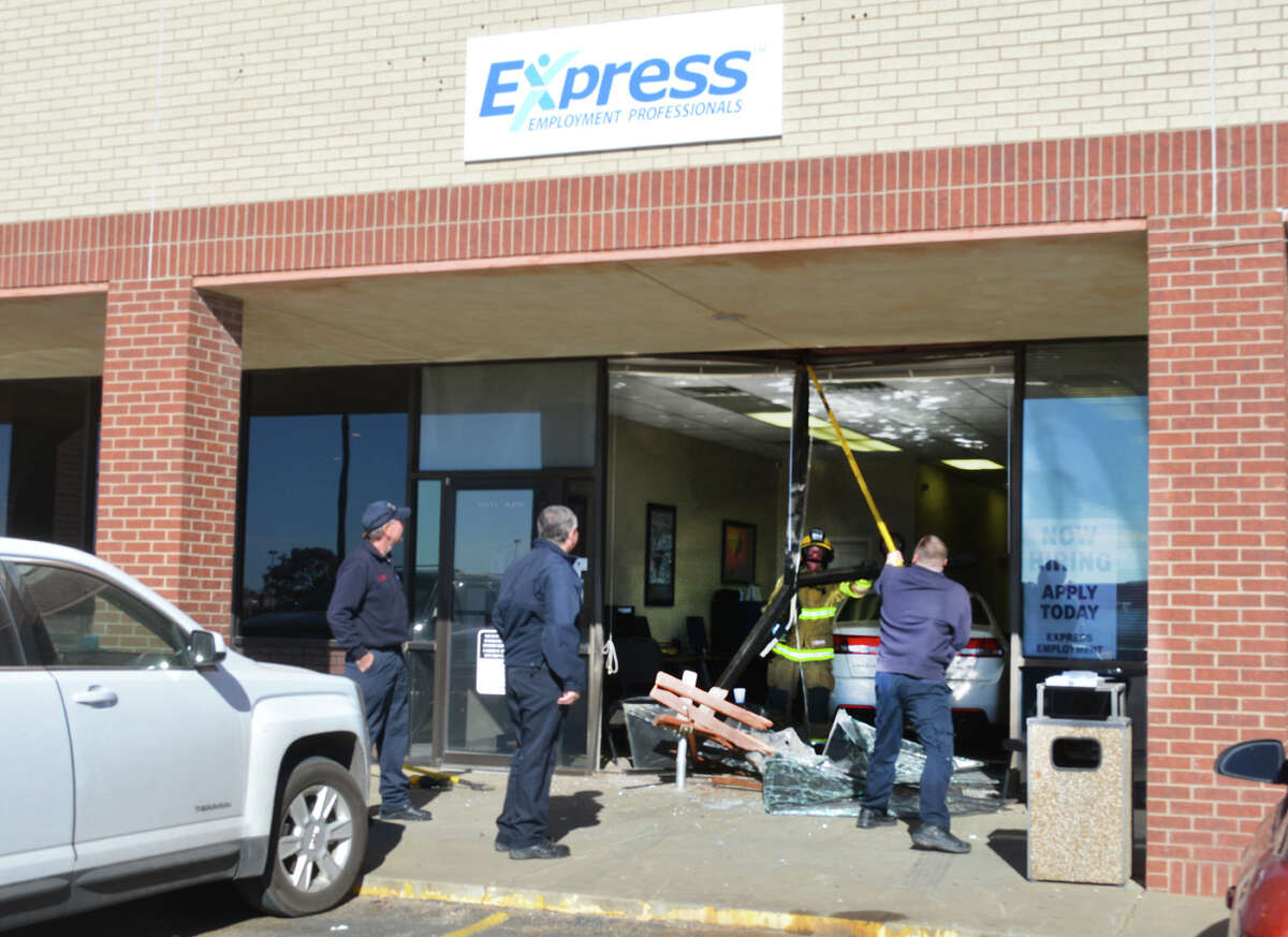 Car drives into business