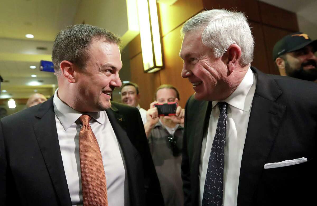 Texas hoped Tom Herman could restore the Longhorns to the heights that his former boss Mack Brown (right) took them, but his tenure ended with no conference championships in four seasons before being fired Saturday.