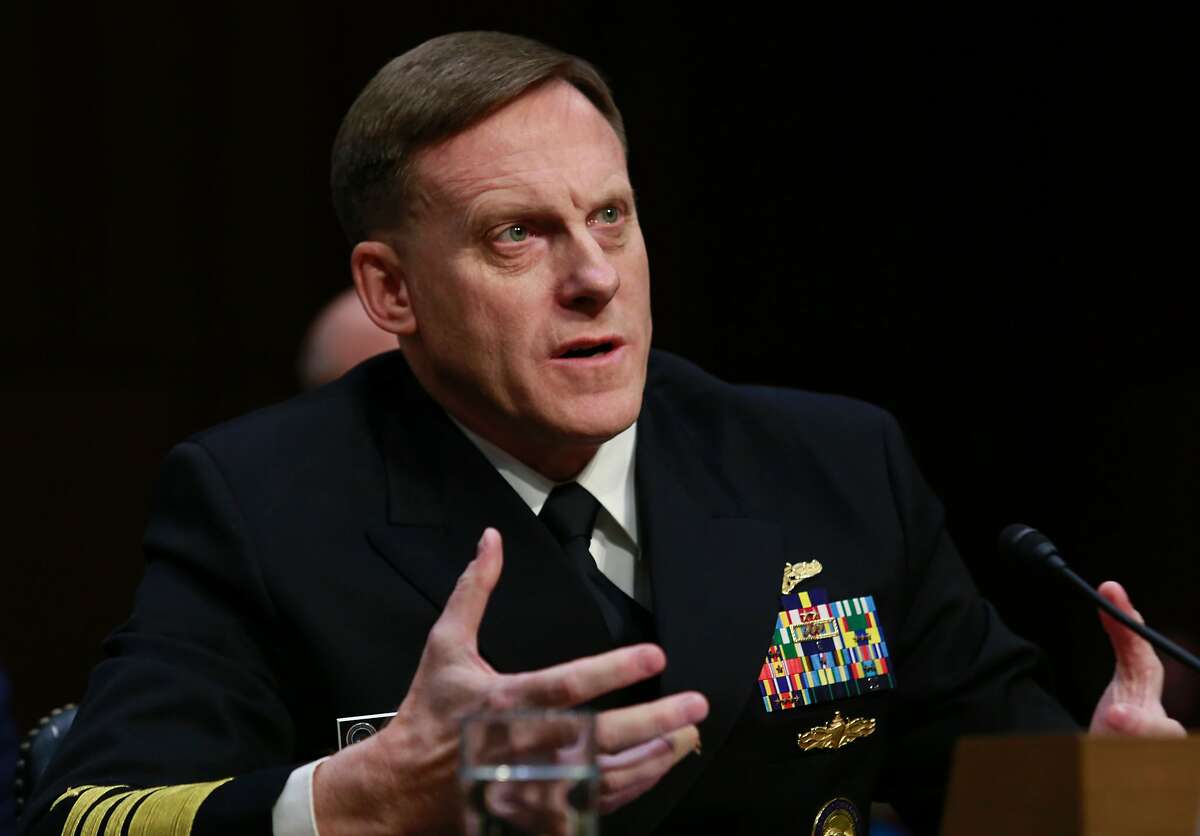 (FILES) This file photo taken on April 5, 2016 shows Navy Adm. Michael Rogers, commander of the US Cyber Command, director of the National Security Agency and chief of Central Security Services, testifies before a Senate Armed Services Committee hearing on Capitol Hill in Washington, DC. Top US military and intelligence leaders are pushing President Barack Obama to fire National Security Agency chief Admiral Michael Rogers, US media reported November 20, 2016, even as Rogers is apparently being considered for a senior position in the Trump administration. / AFP PHOTO / YURI GRIPASYURI GRIPAS/AFP/Getty Images