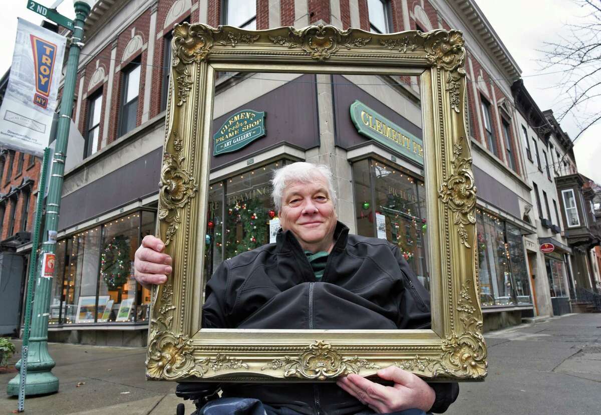 Co-owner Tom Clement outside the Clement Frame Shop at Monument Square Tuesday Nov. 29, 2016 in Troy, NY. (John Carl D'Annibale / Times Union)