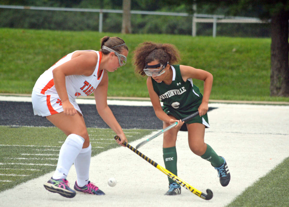 Edwardsville senior Rylie Murray, left, battles for the ball with a Pattonville player during Tuesday's game at EHS.
