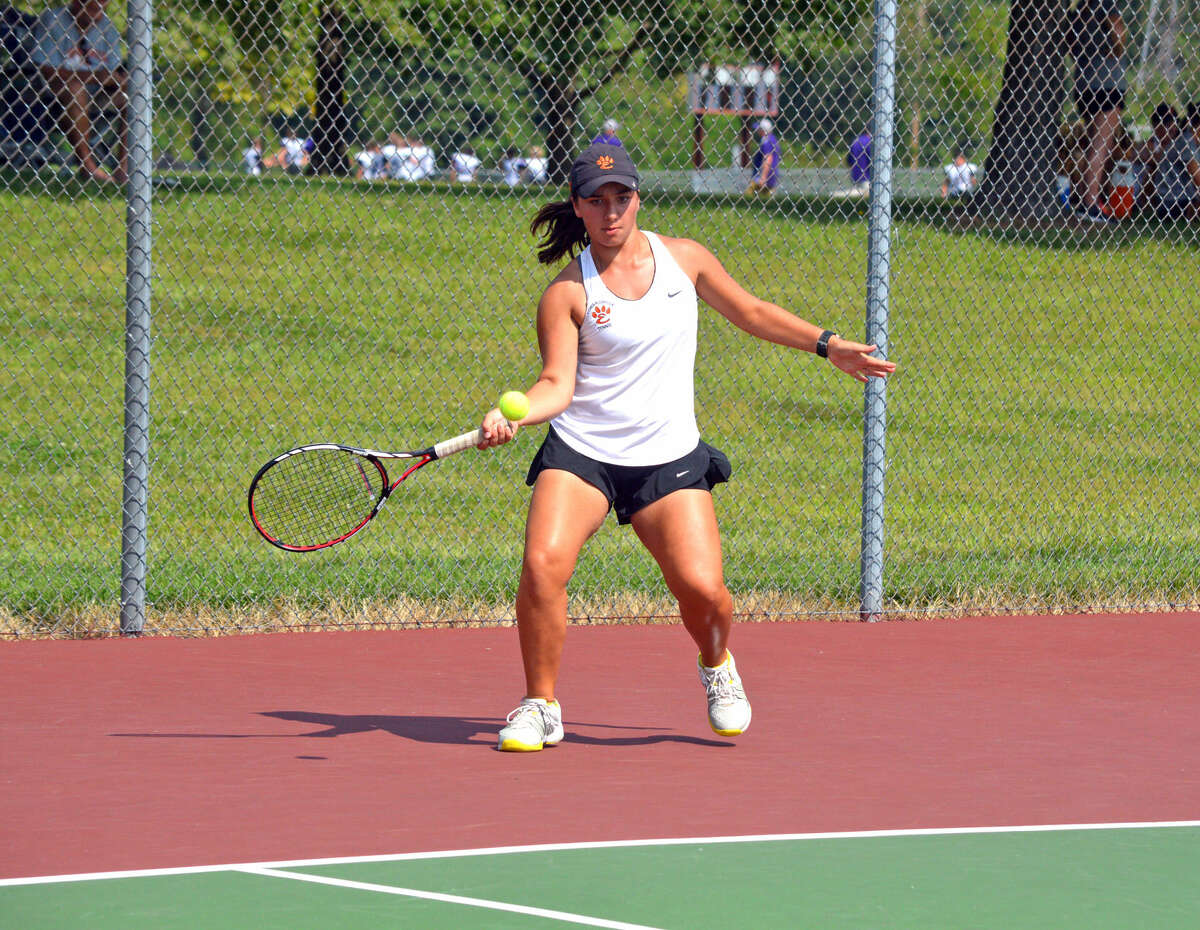 Edwardsville's Natalie Karibian makes a forehand return on Saturday during her No. 1 singles match against Normal Community at the Southern Illinois Duals.