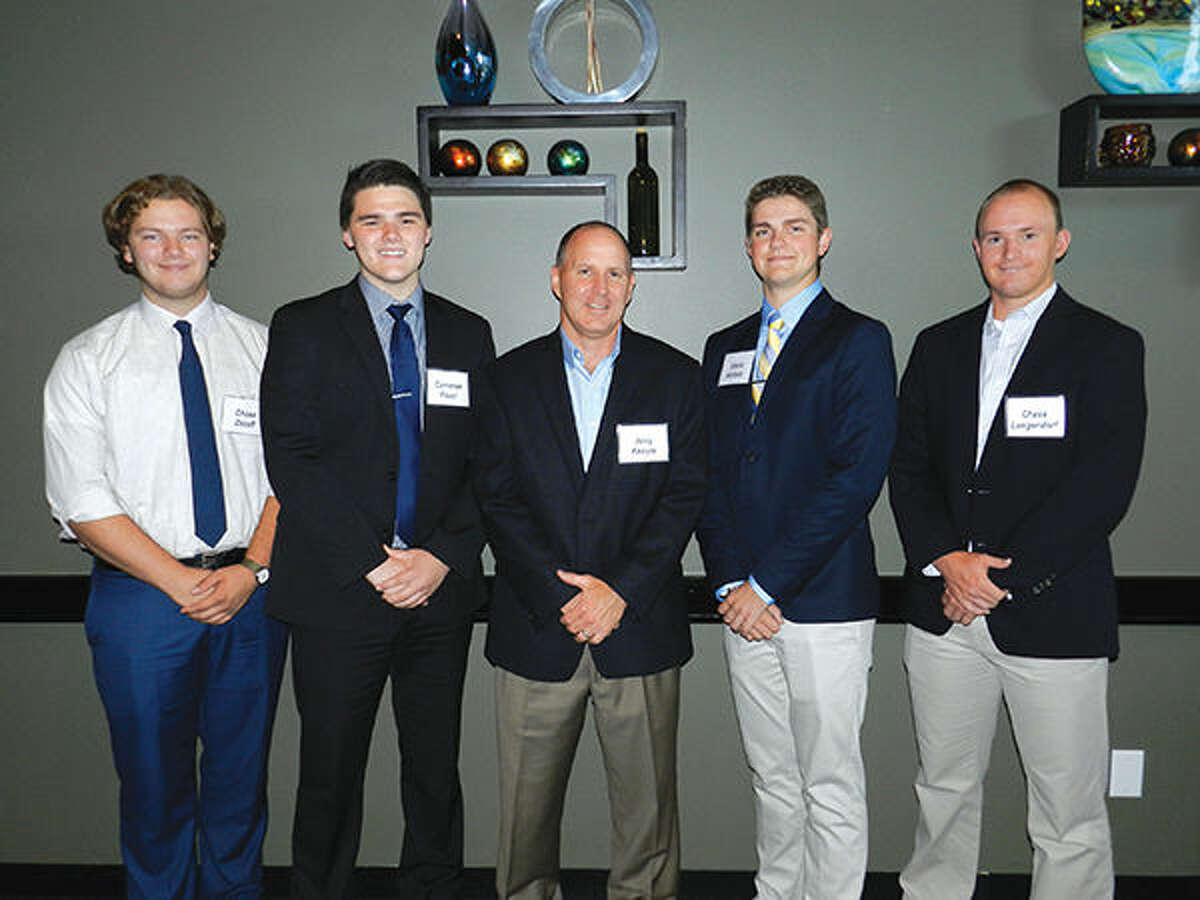 Wood River Refinery Manager Jerry Knoyle congratulates the Phillips 66 Dependent Scholarship recipients. From left are: Chase Zezoff, Cameron Foust,  Knoyle, Shane Nichols, and Chase Langendorf.