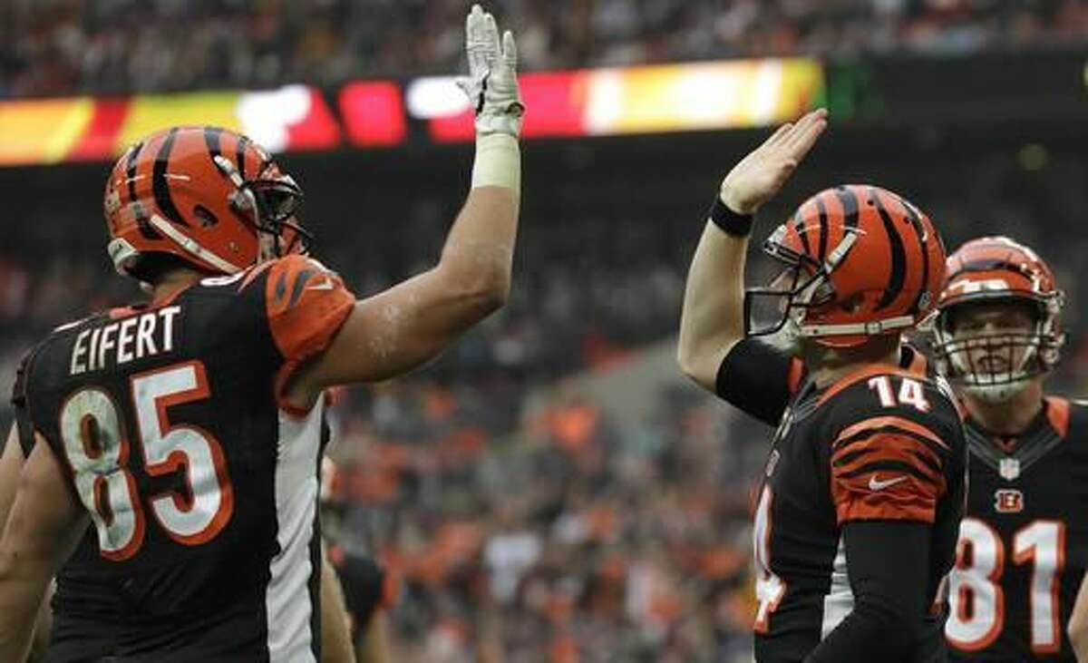 Cincinnati Bengals quarterback Andy Dalton (14) and quarterback AJ