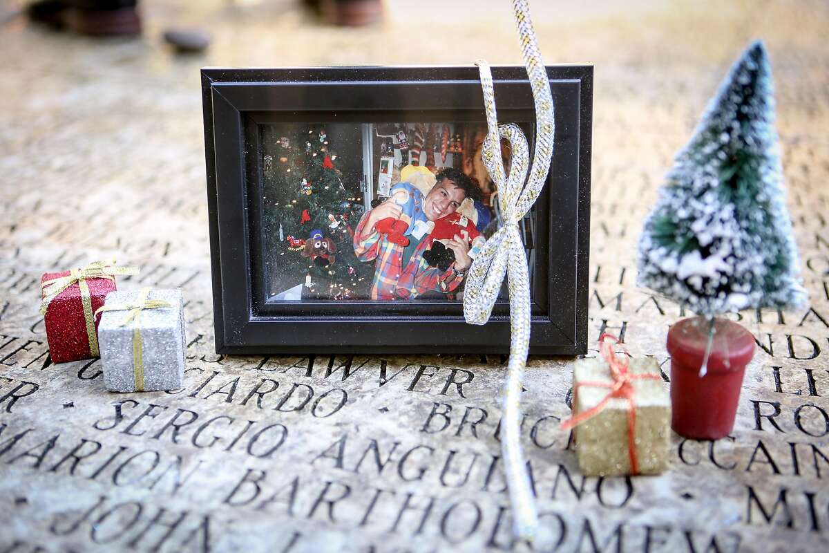 A photo and small holiday scene was placed on the Circle of Friends Memorial in Golden Gate Park on Thursday, December 1, 2016 in San Francisco, Calif.