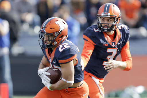 George leads Illinois to 31-27 win over Michigan State