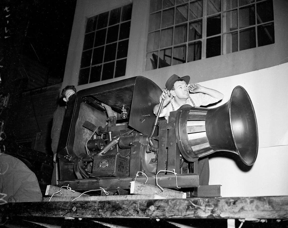 H.M. Geraghty ready to demonstrate an air raid siren manufactured by E.D. Bullard Company in san Francisco Photo ran 12/13/1941