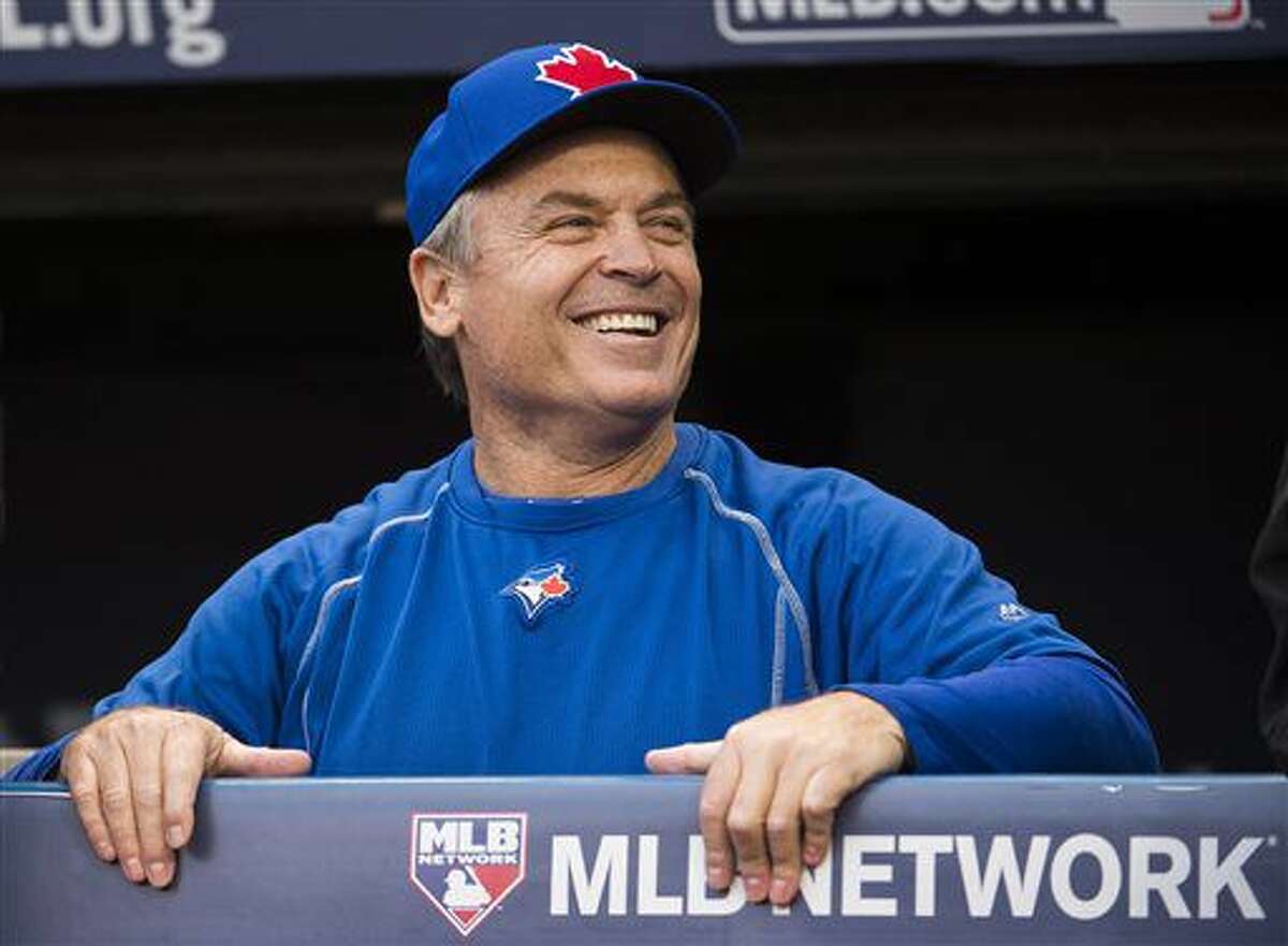 Toronto Blue Jays manager John Gibbons laughs during batting practice Thursday, Oct. 13, 2016, in Cleveland. The Blue Jays are scheduled to face the Cleveland Indians in Game 1 of baseball's American League Championship Series on Friday. (Nathan Denette/The Canadian Press via AP)