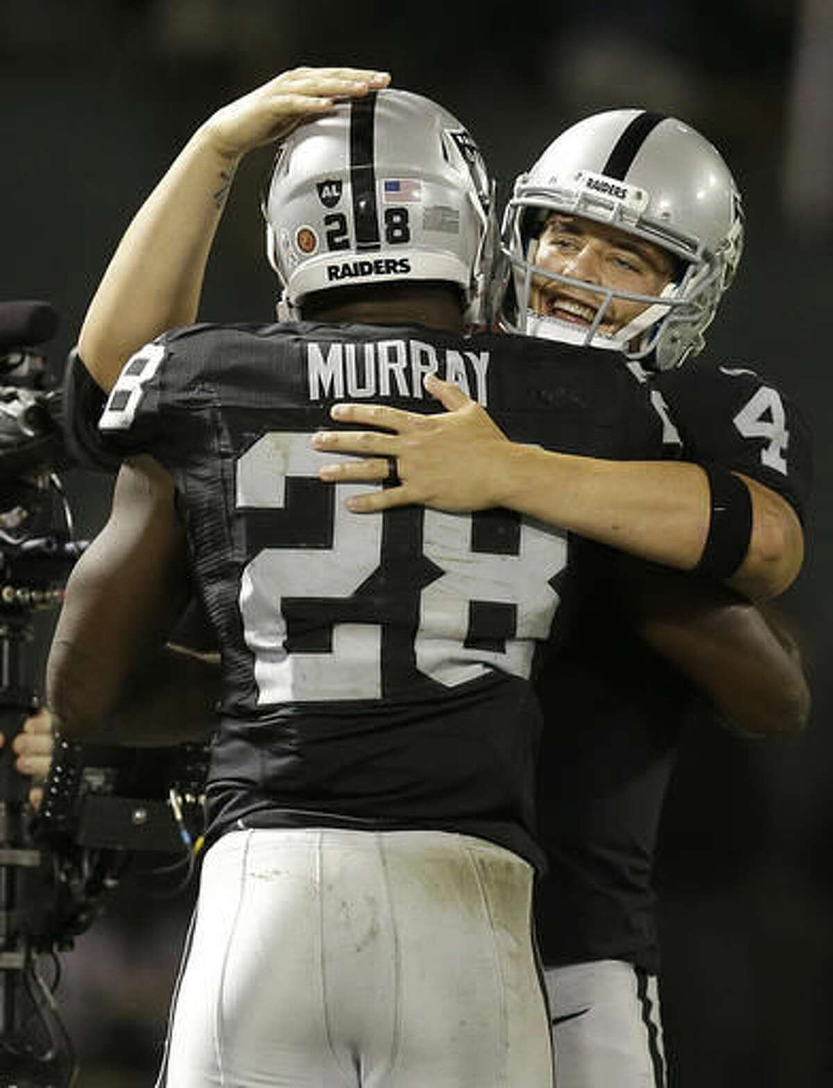 Raiders run past Broncos 30-20 for AFC West lead