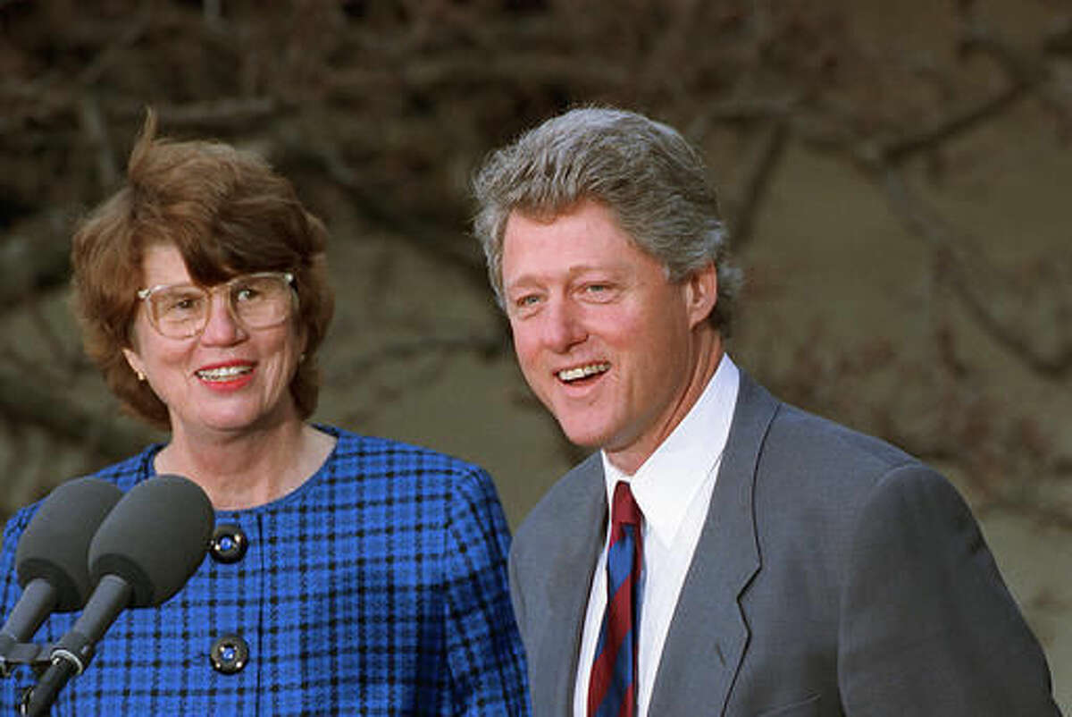 FILE - In this Feb. 12, 1993 file photo, U.S. President Bill Clinton names Janet Reno the nation's first female attorney general at a ceremony in the Rose Garden at the White House in Washington. Reno, the first woman to serve as U.S. attorney general and the epicenter of several political storms during the Clinton administration, has died early Monday, Nov. 7, 2016. She was 78. (AP Photo/Doug Mills, File)