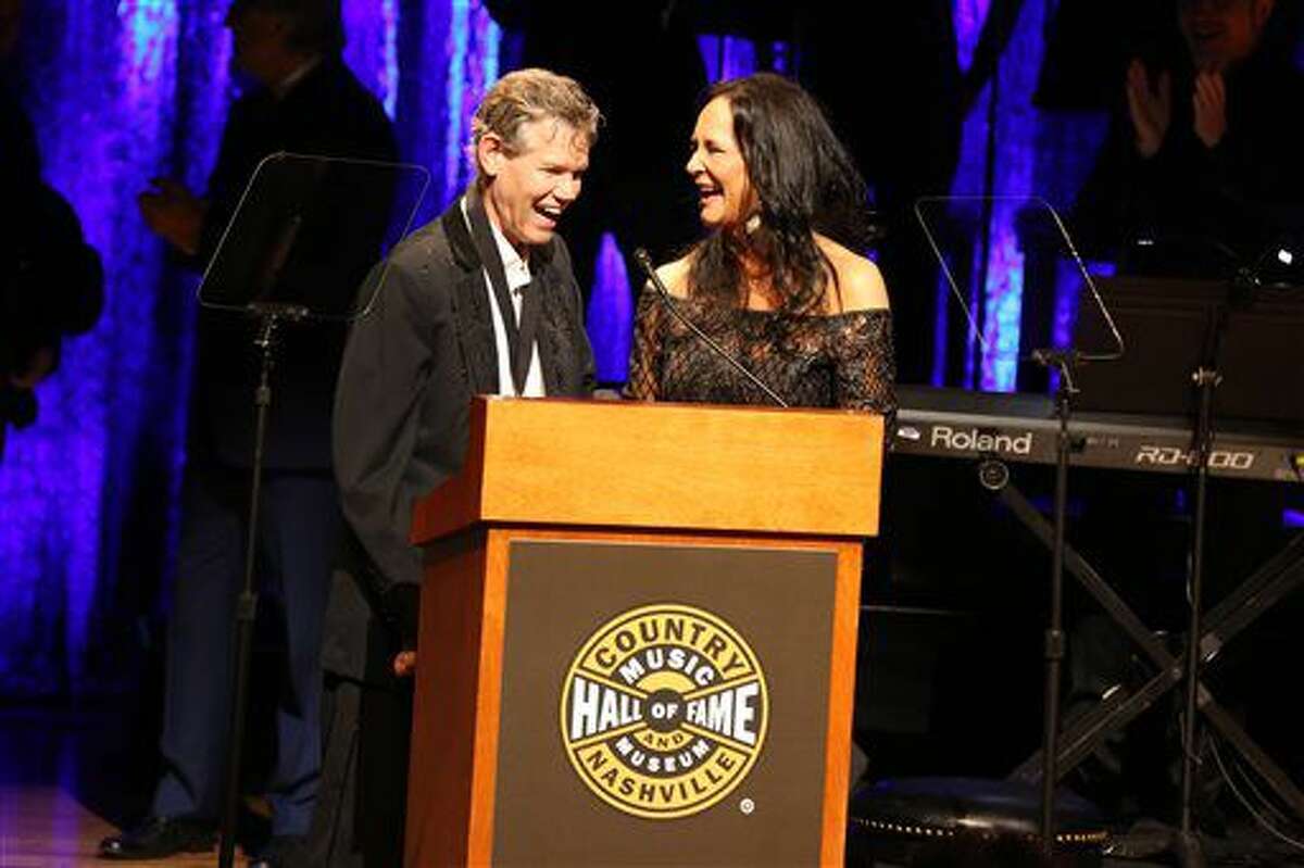 From left, artist Randy Travis and wife Mary Travis as the Country Music Hall of Fame Medallion Ceremony at the Country Music Hall of Fame and Museum on Sunday, Oct. 16, 2016 in Nashville, Tenn. (Photo by Laura Roberts/Invision/AP)
