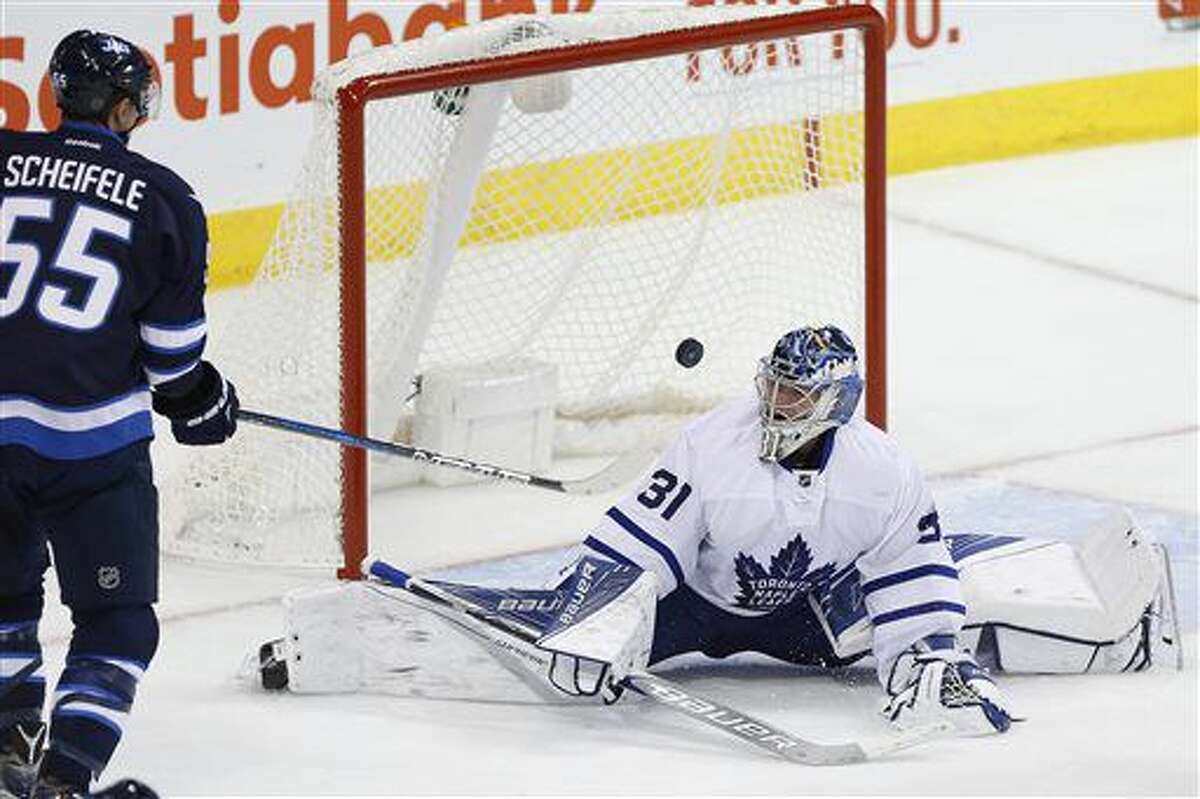 Laine gets 3rd goal in OT to lift Jets over Maple Leafs