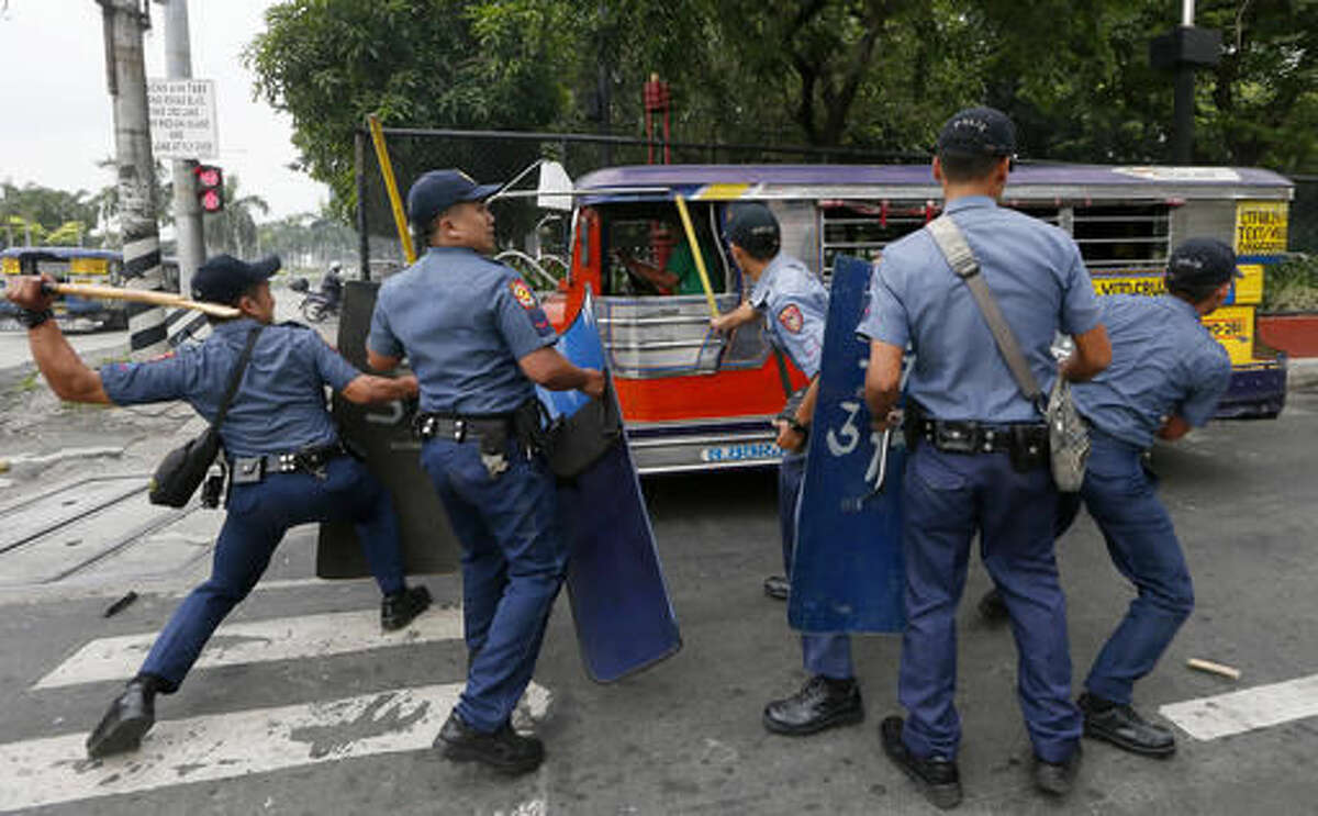 Philippine police van rams anti-US protesters in front of US Embassy 