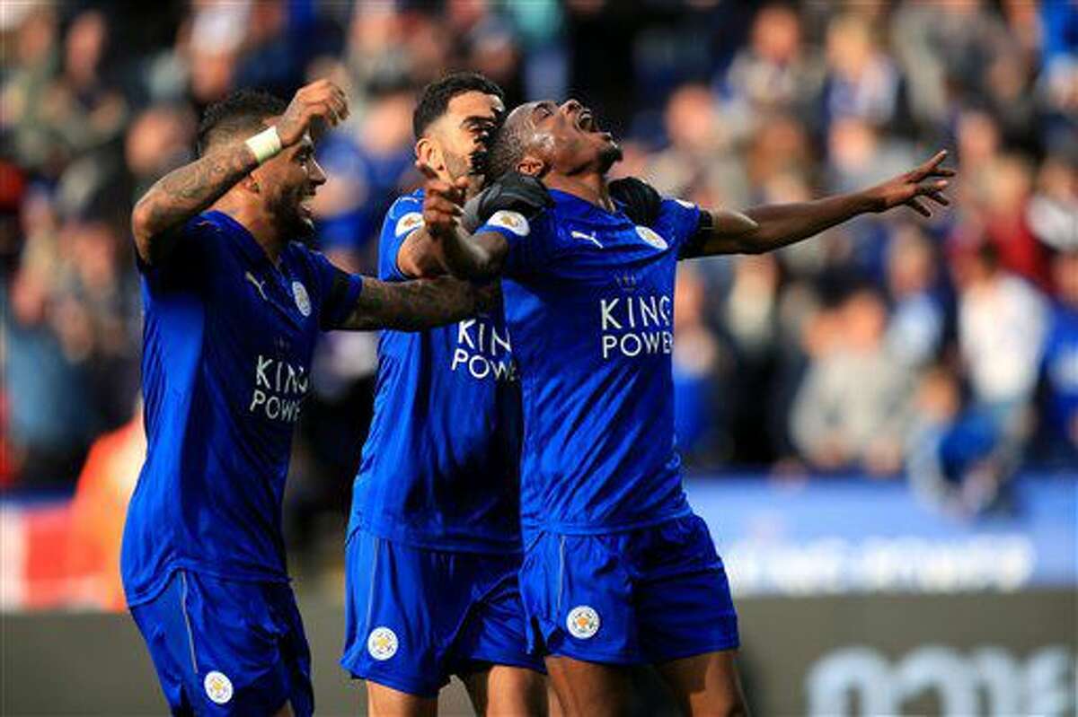 Leicester City's Ahmed Musa, right, celebrates scoring during the English Premier League soccer match between Leicester City and Crystal Palace at the King Power Stadium, Leicester, England, Saturday, Oct. 22, 2016. (Mike Egerton/PA via AP)