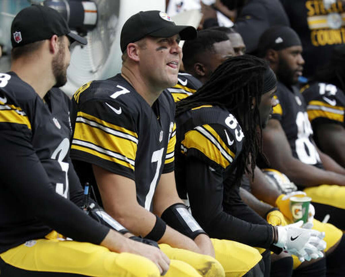 FILE - In this Sunday, Oct. 16, 2016, file photo, Pittsburgh Steelers quarterback Ben Roethlisberger (7) sits on the sidelines during the second half of an NFL football game against the Miami Dolphins in Miami Gardens, Fla. Backup QB Landry Jones is set to guide the Steelers against the New England Patriots, while Roethlisberger recovers from left knee surgery. (AP Photo/Lynne Sladky, File)