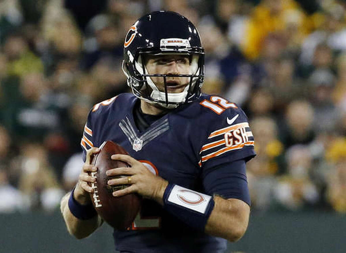 Chicago Bears quarterback Matt Barkley (12) looks for a receiver during the first half of an NFL football game against the Green Bay Packers, Thursday, Oct. 20, 2016, in Green Bay, Wis. (AP Photo/Mike Roemer)