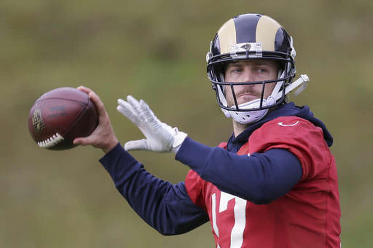 CORRECTS NAME TO NEW YORK GIANTS Los Angeles Rams quarterback Case Keenum takes part in a practice session at Pennyhill Park Hotel in Bagshot, England, Friday Oct. 21, 2016. The Los Angeles Rams are due to play the New York Giants at Twickenham stadium in London on Sunday in a regular season NFL game. (AP Photo/Tim Ireland)
