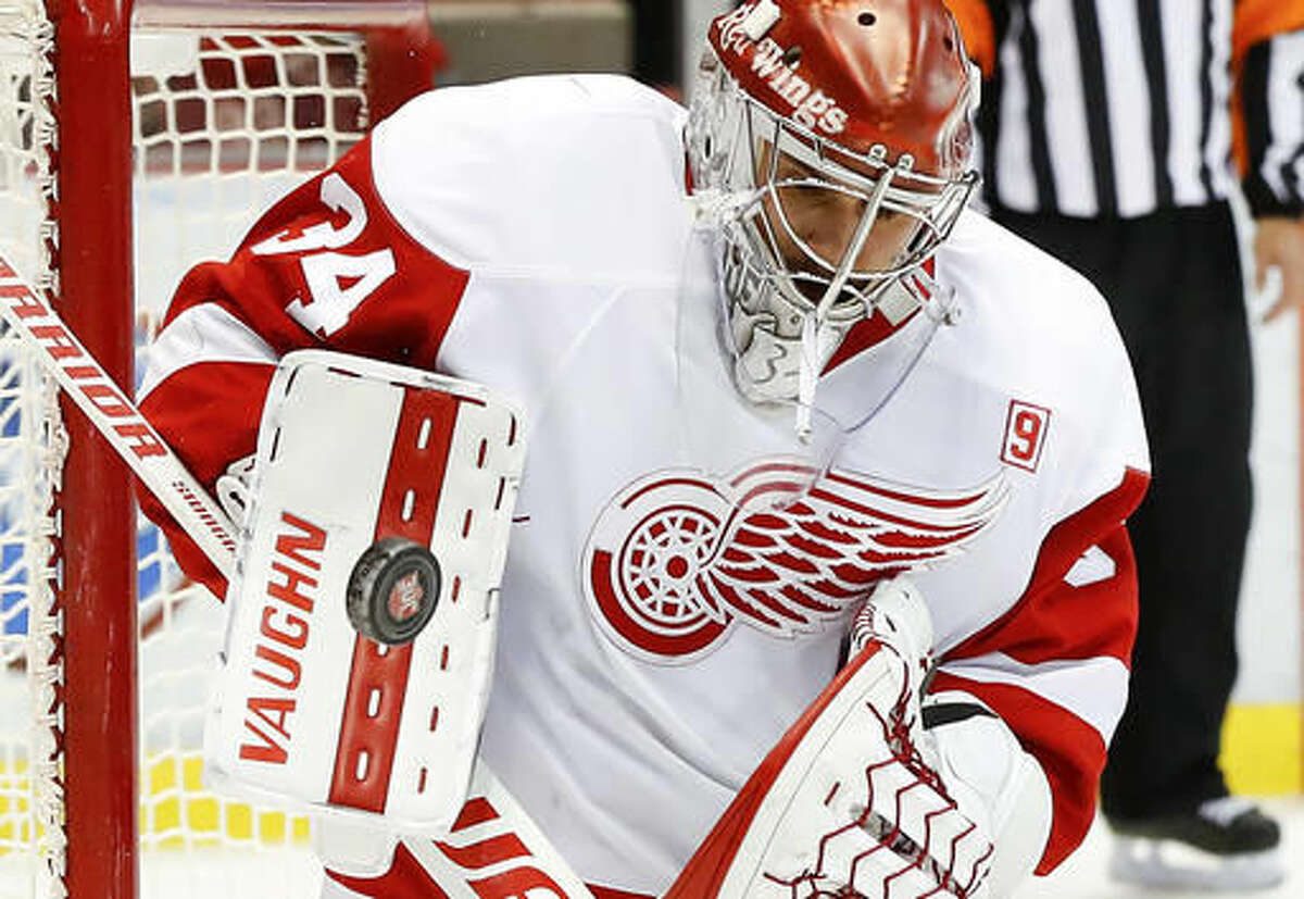 Detroit Red Wings goalie Petr Mrazek stops a Nashville Predators shot in the first period of an NHL hockey game Friday, Oct. 21, 2016, in Detroit. (AP Photo/Paul Sancya)