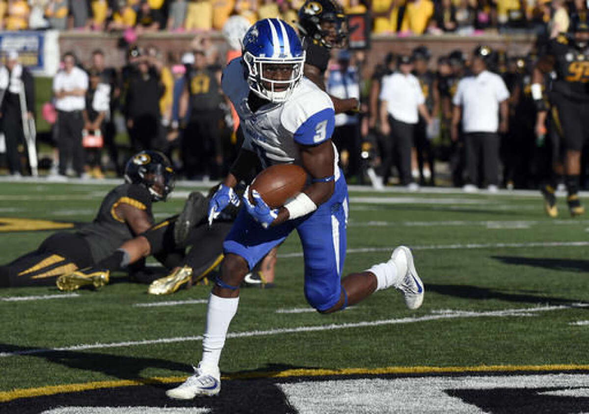 Middle Tennessee wide receiver Richie James carries the ball after catching a pas and running it in 56 yards for a touchdown during the first half of an NCAA college against Missouri football game, Saturday, Oct. 22, 2016, in Columbia, Mo. (AP Photo/L.G. Patterson)