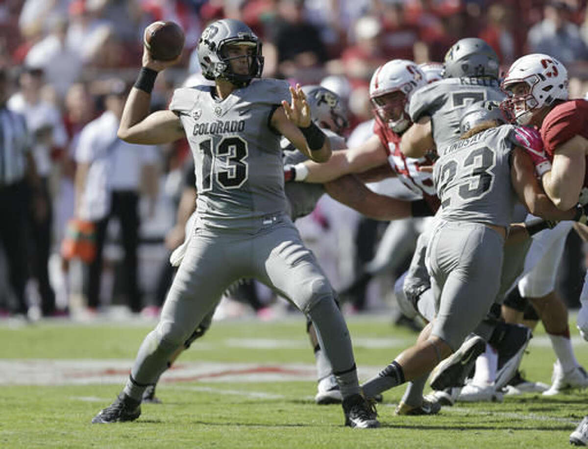 Colorado quarterback Sefo Liufau (13) passes against Stanford during the first half of an NCAA college football game, Saturday, Oct. 22, 2016, in Stanford, Calif. (AP Photo/Ben Margot)