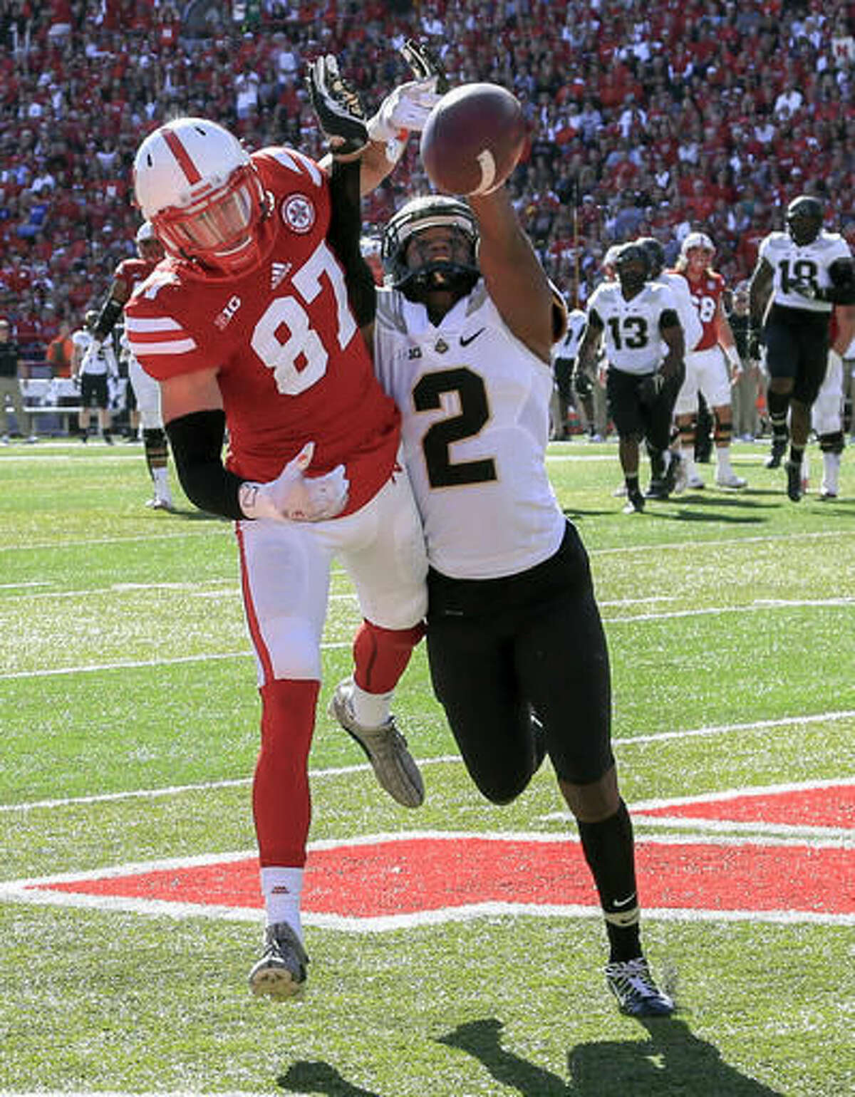 Purdue cornerback Da'Wan Hunte (2) breaks up a pass intended for Nebraska wide receiver Brandon Reilly (87) during the first half of an NCAA college football game in Lincoln, Neb., Saturday, Oct. 22, 2016. (AP Photo/Nati Harnik)