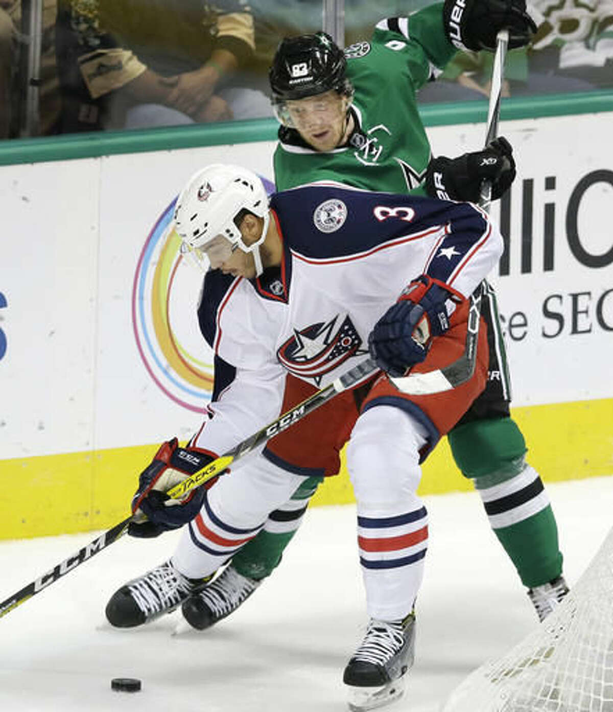 Columbus Blue Jackets defenseman Seth Jones (3) and Dallas Stars right wing Ales Hemsky (83) skate for the puck during the first period of an NHL hockey game Saturday, Oct. 22, 2016, in Dallas. (AP Photo/LM Otero)