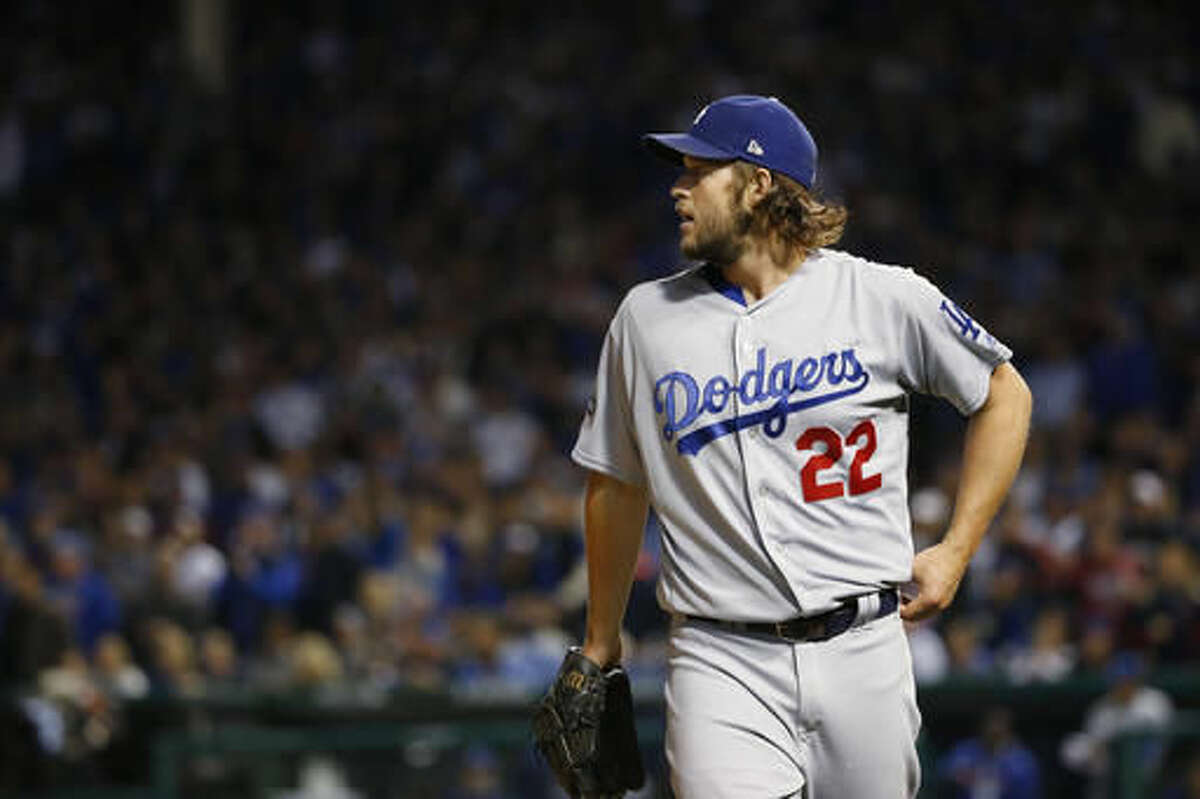 Los Angeles Dodgers starting pitcher Clayton Kershaw (22) watches after Chicago Cubs' Ben Zobrist flies out to center during the third inning of Game 6 of the National League baseball championship series Saturday, Oct. 22, 2016, in Chicago. (AP Photo/Nam Y. Huh)